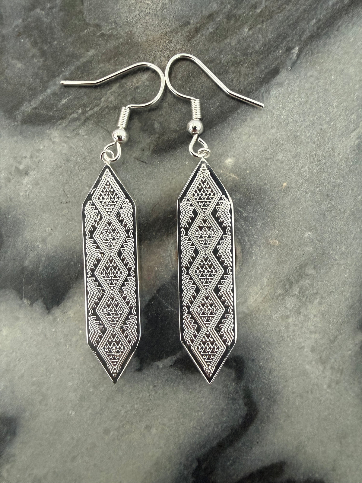 Silver Taniko hou earrings