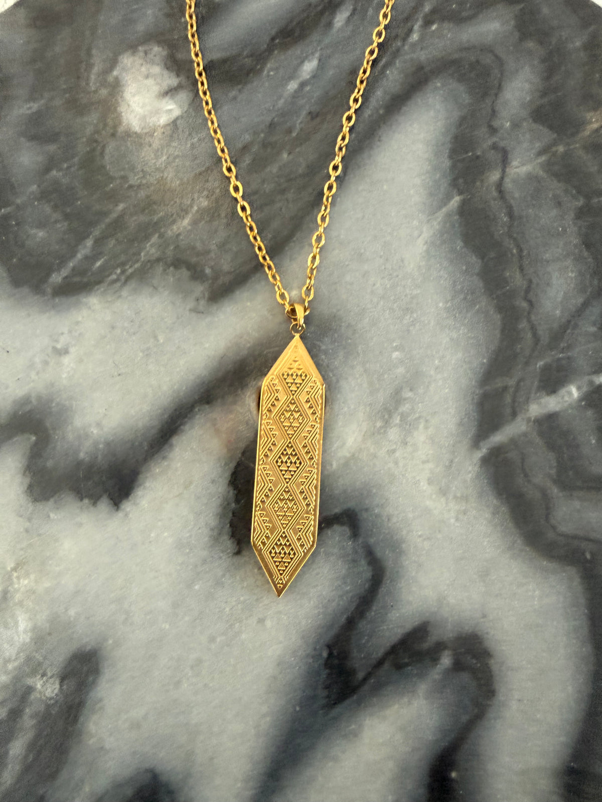 Gold Taniko hou pendant