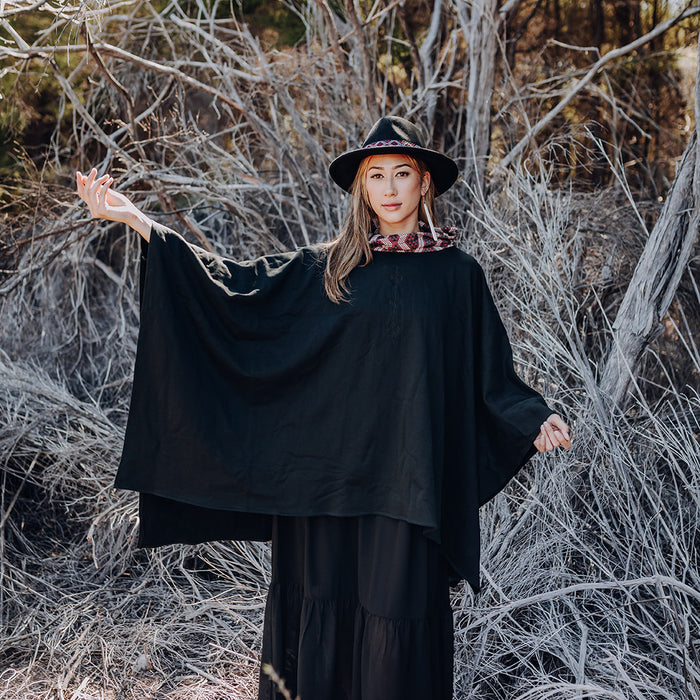 Waharua Kōpito with Taimana Embroidery Poncho - Black