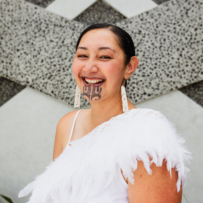 Kākahu Huruhuru - White