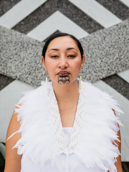 Kākahu Huruhuru - White