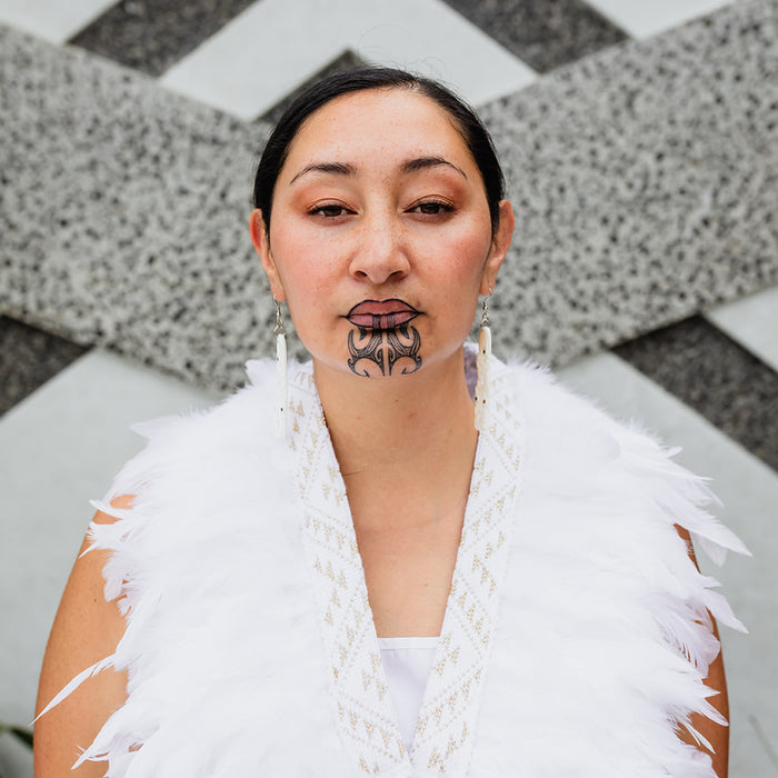 Kākahu Huruhuru - White