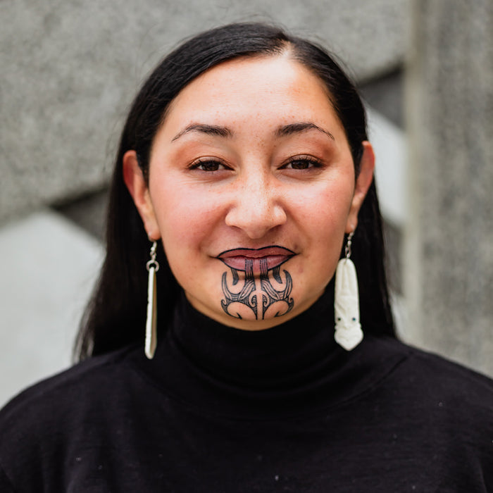 Bone Toki Earrings with Tiki Pattern