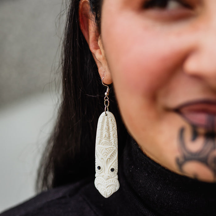 Bone Toki Earrings with Tiki Pattern