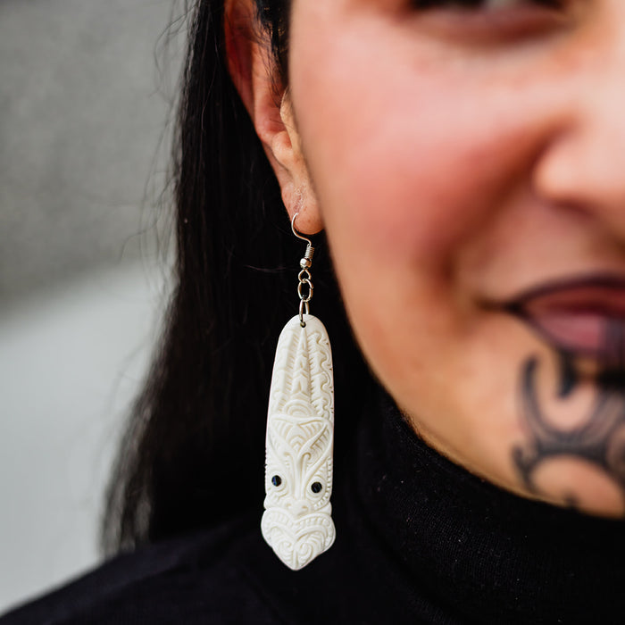 Bone Toki Earrings with Tiki Pattern