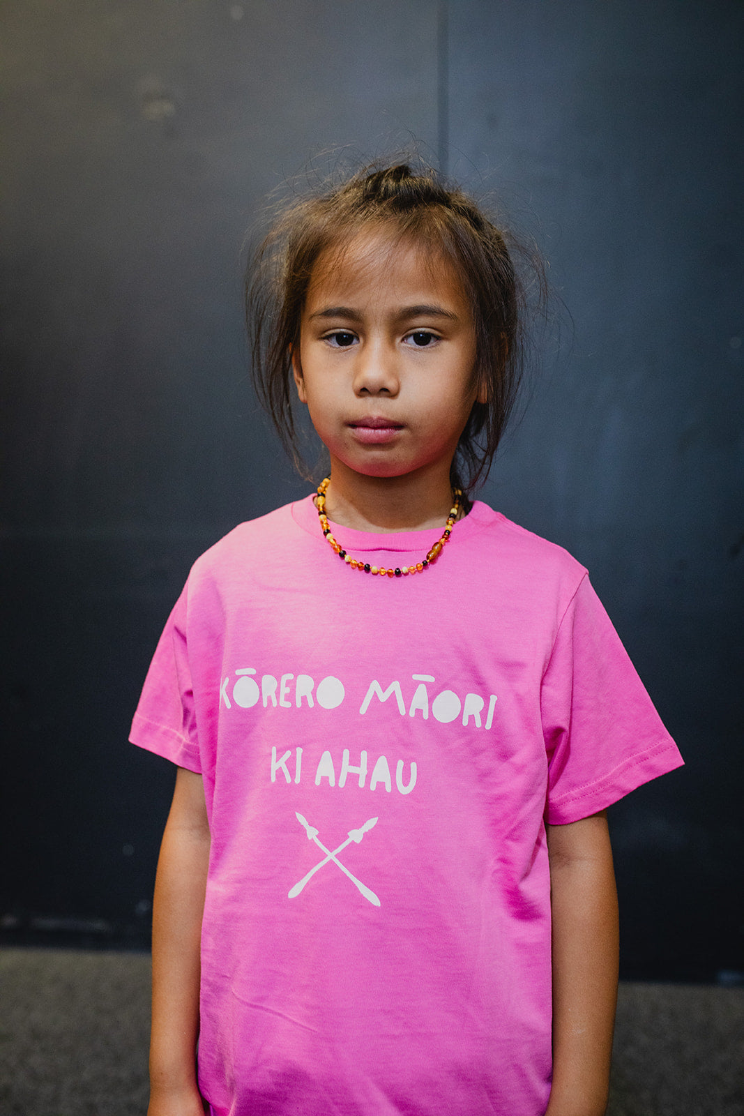 Kōrero Mai Print Child Tee - Pink