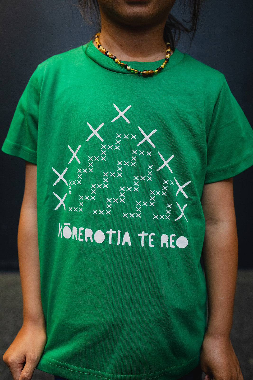 Kainga Korerotia Te Reo Print Child Tee - Green