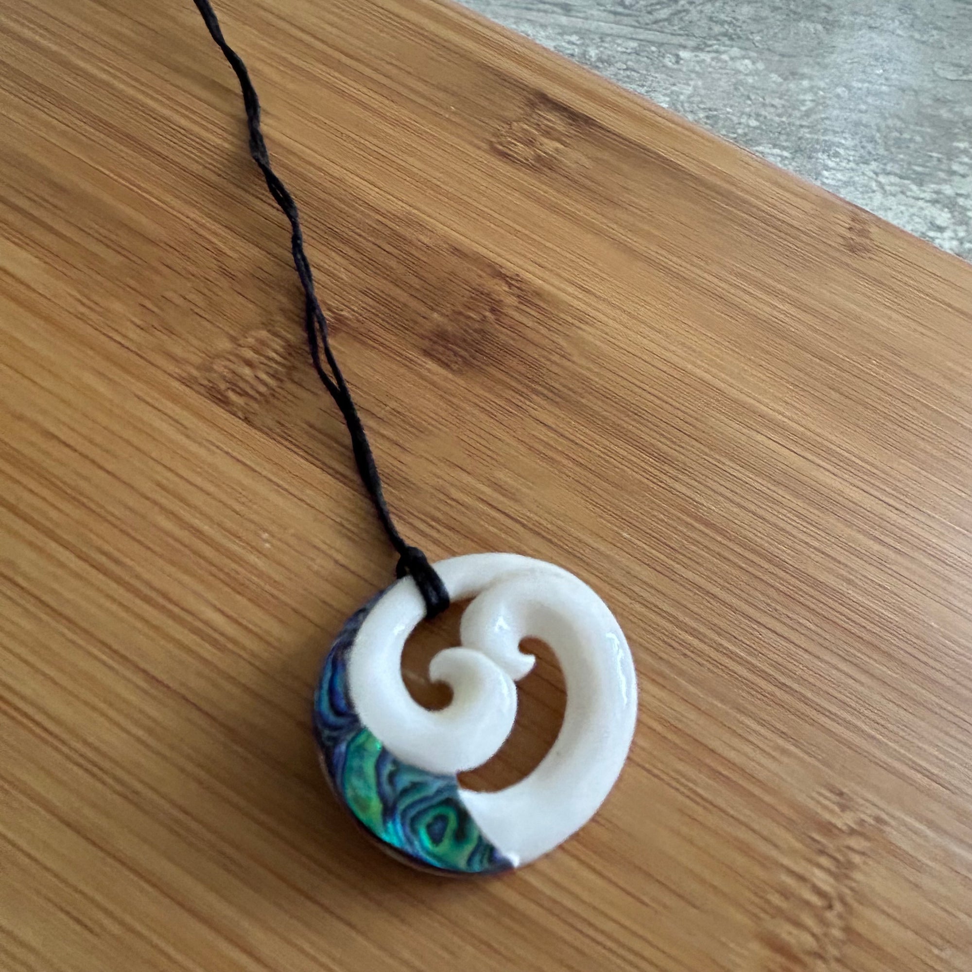 Bone Double Koru Pendant